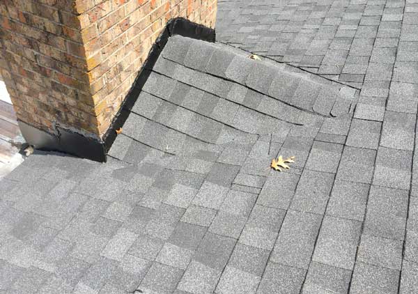 Chimney Roof Flashing Repair In Tn Fixing Leaks Around Chimneys Cricket Built On Roof Near Chimney