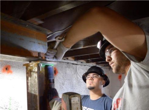 Stabilizing basement with strong backs