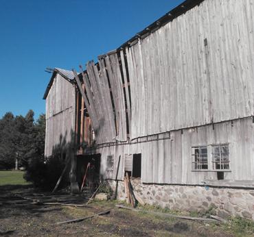 Sagging barn in [territory]