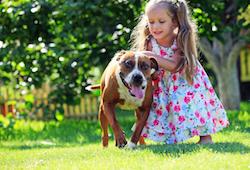 Girl and dog in NJ backyard